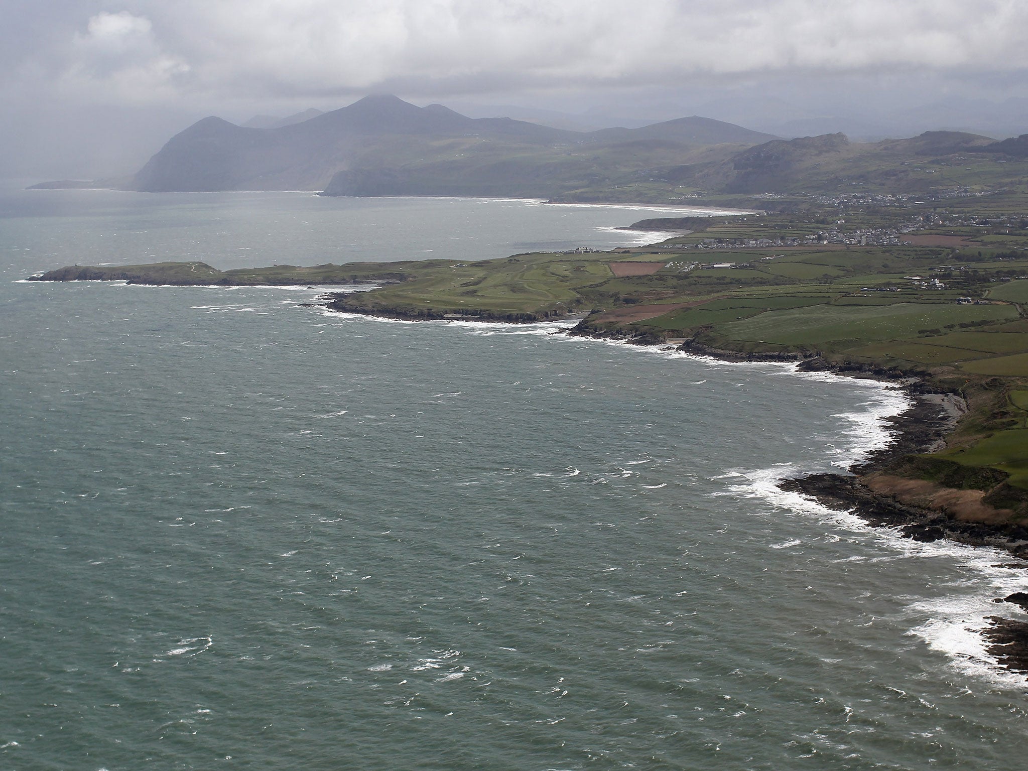 Two bodies were pulled from the sea off the coast of Anglesey