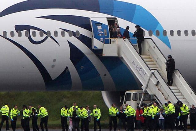Scottish police wait to interview passengers from the Egypt Air flight