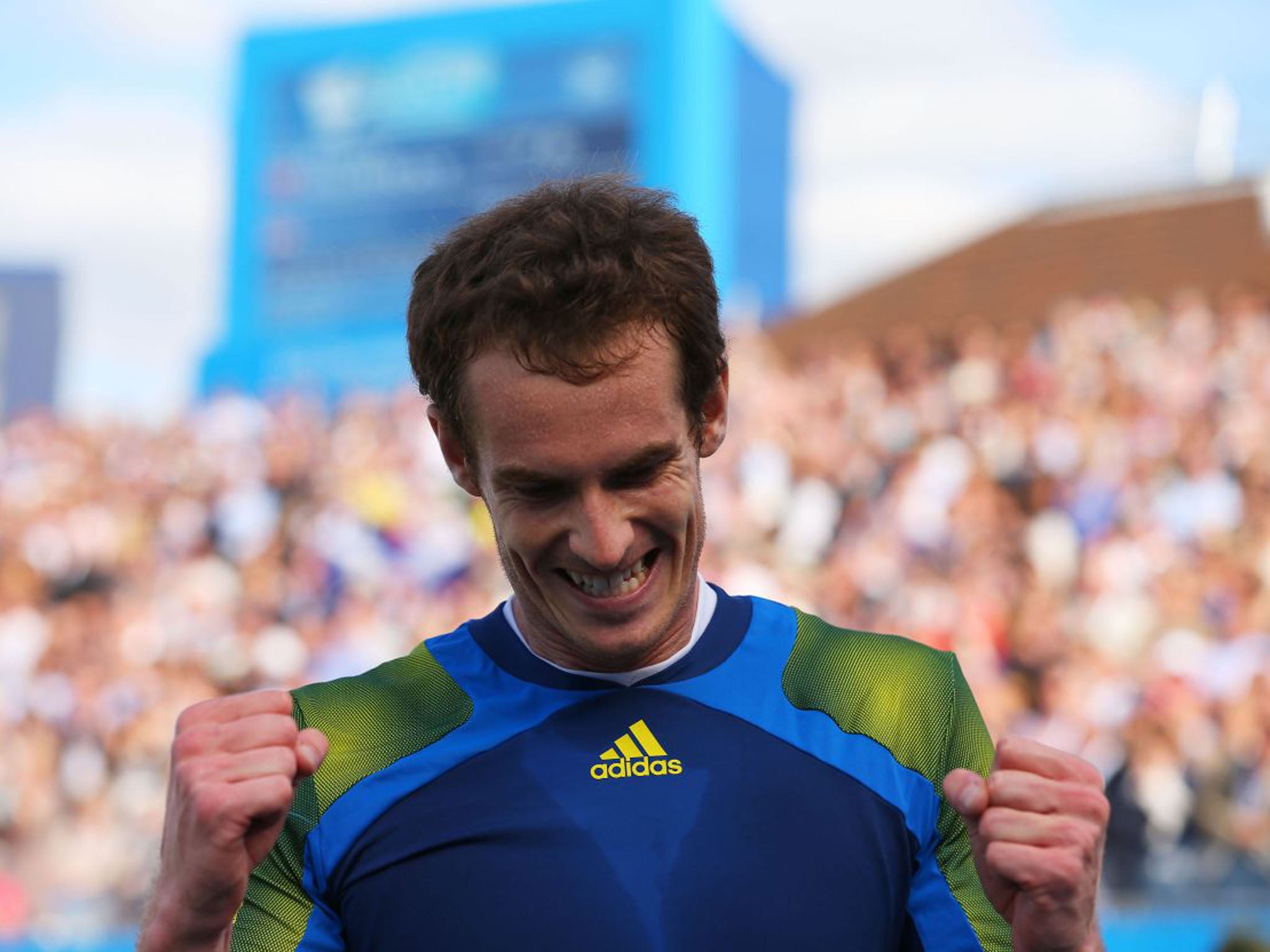 Andy Murray celebrates after clinching a come-from-behind victory, having lost the first set (Julian Finney/Getty Images)