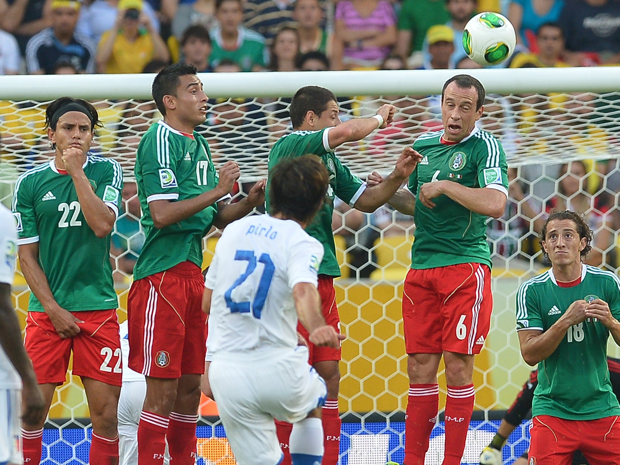 Italy's midfielder Andrea Pirlo (21) takes a free kick to score against Mexico during their FIFA Confederations Cup Brazil 2013 Group A football matc