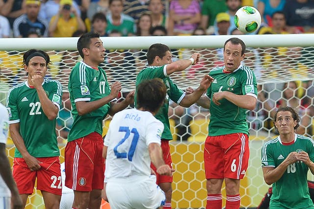 Italy's midfielder Andrea Pirlo (21) takes a free kick to score against Mexico during their FIFA Confederations Cup Brazil 2013 Group A football matc