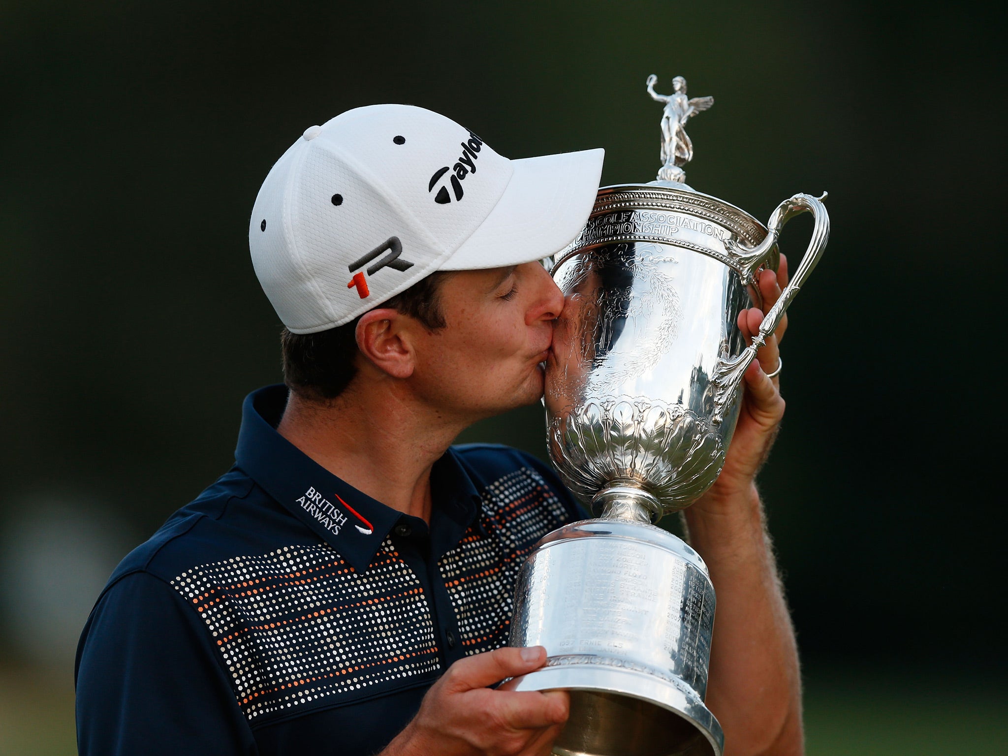 Justin Rose celebrates victory at the US Open