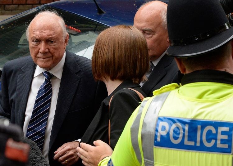 Stuart Hall arrives at Preston Crown Court for sentencing on 17 June 2013