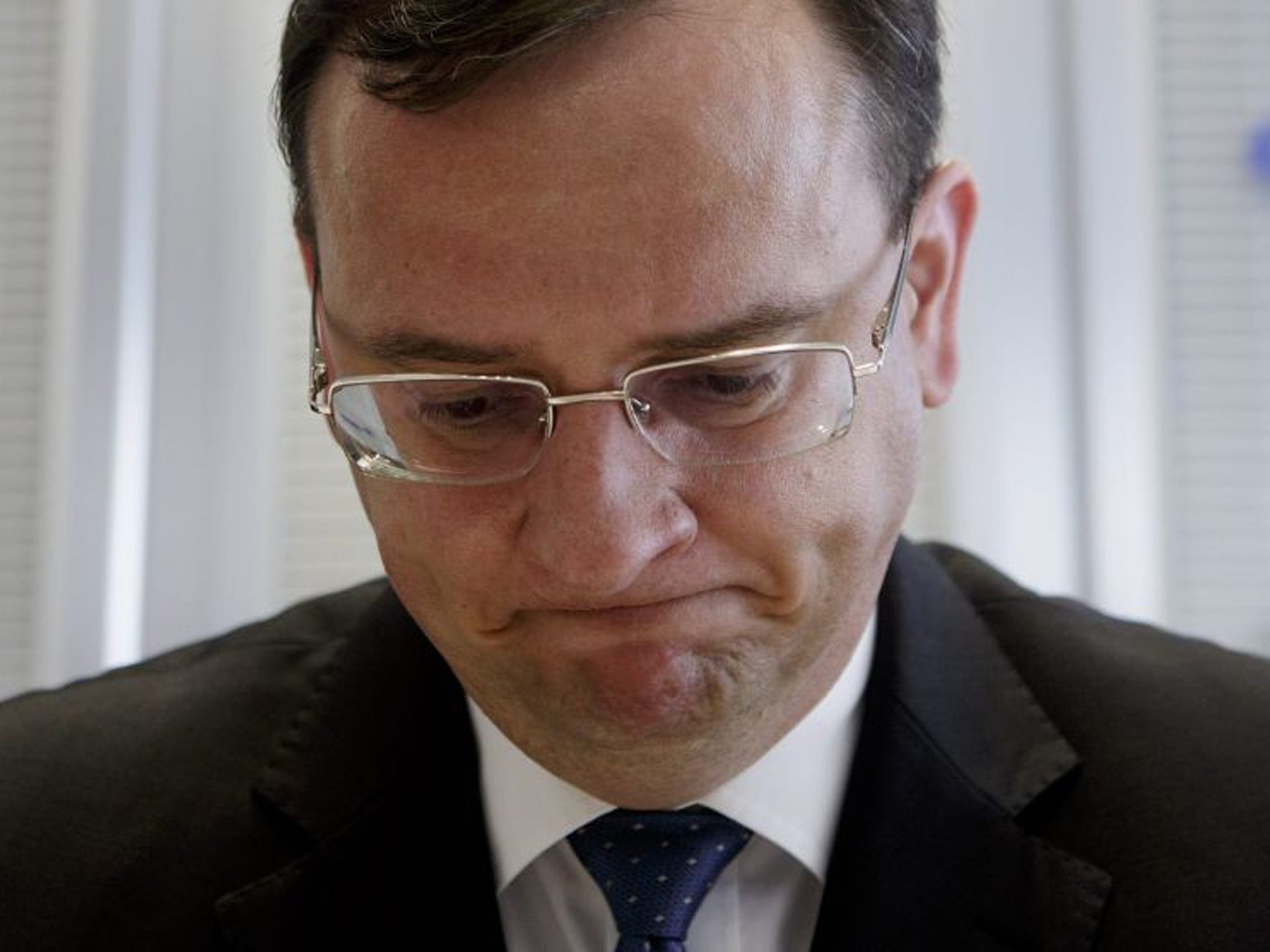 Petr Necas told a televised briefing that he was aware of his 'political responsibility'