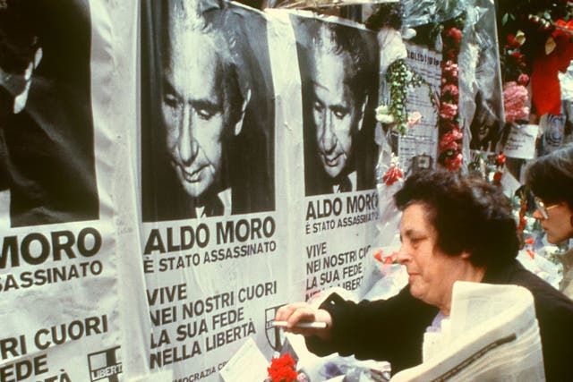 Mourners lay flowers and pay their respects to Aldo Moro upon his assassination in 1978