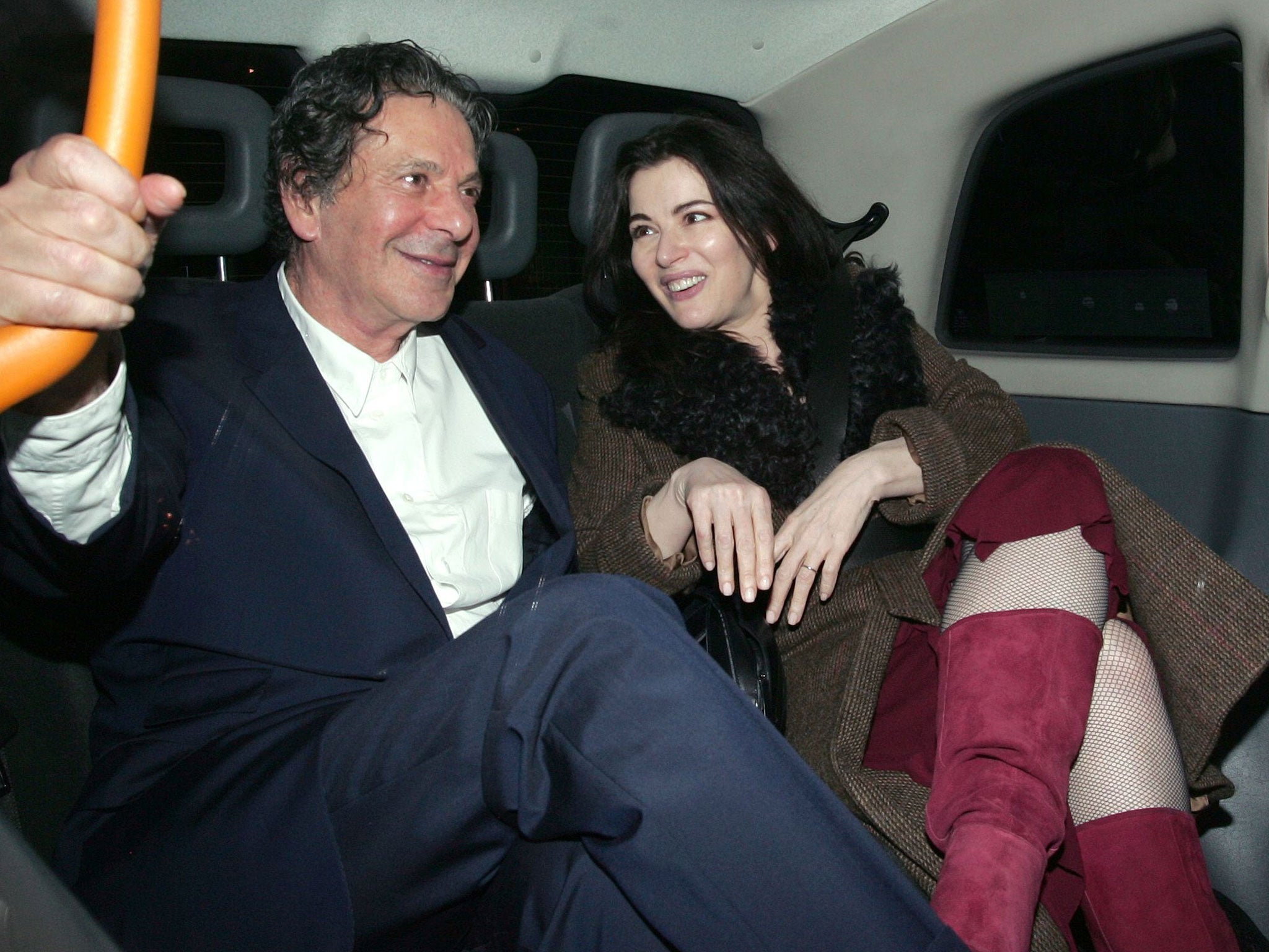Charles Saatchi with his wife, Nigella Lawson, in March last year