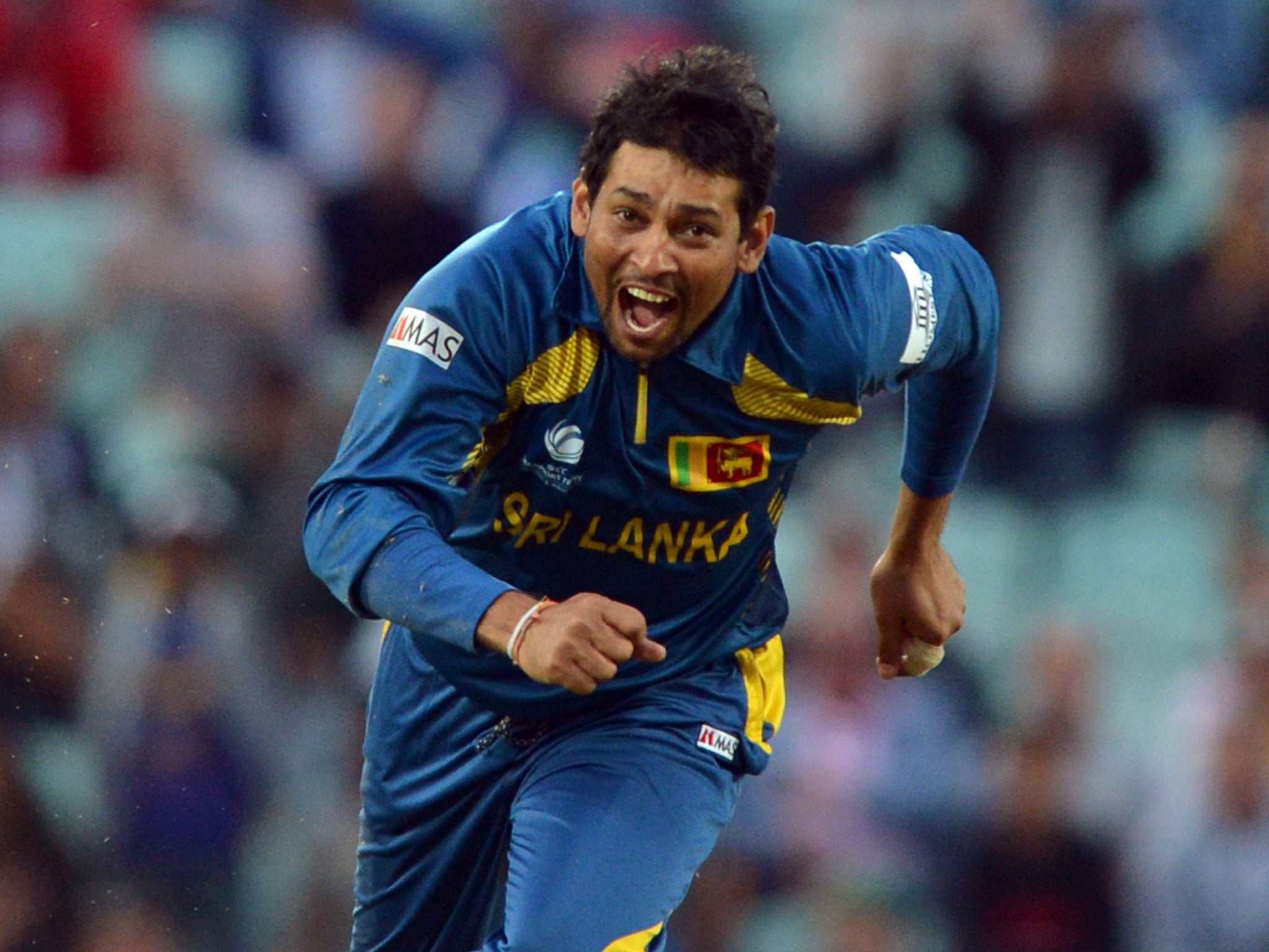 Tillakaratne Dilshan celebrates taking the final Australian wicket to win the game