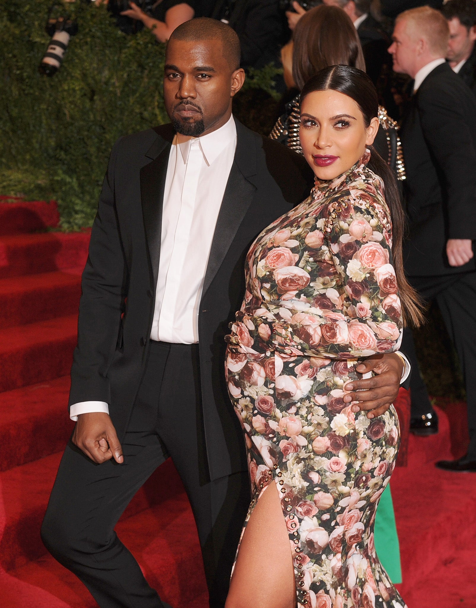 Kanye West and a heavily pregnant Kim Kardashian at the Met Ball in May. They have called their baby daughter North West
