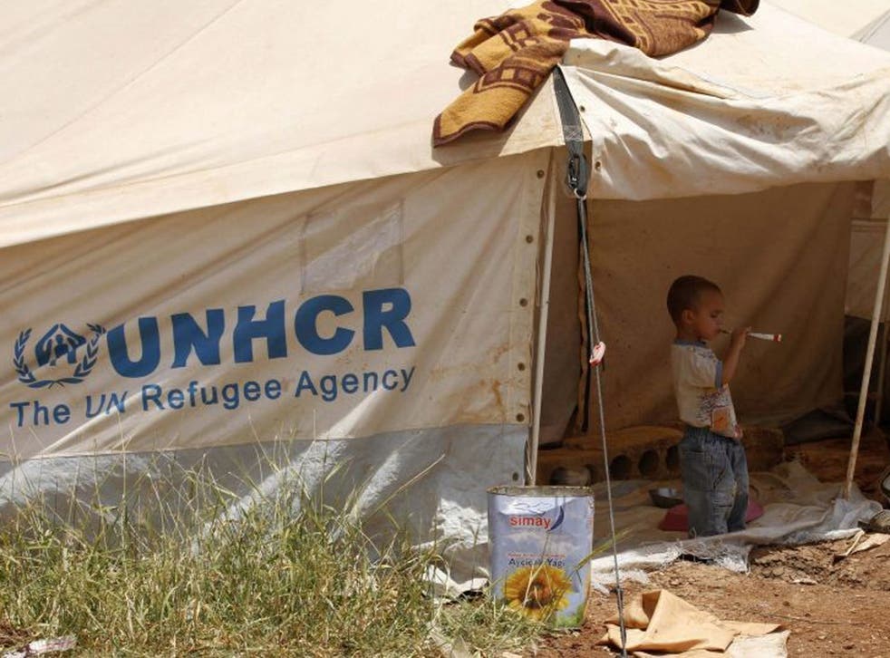 A Syrian boy refugee in the Bab al-Salam refugee camp in Azaz, near the Syrian-Turkish border in June 2013
