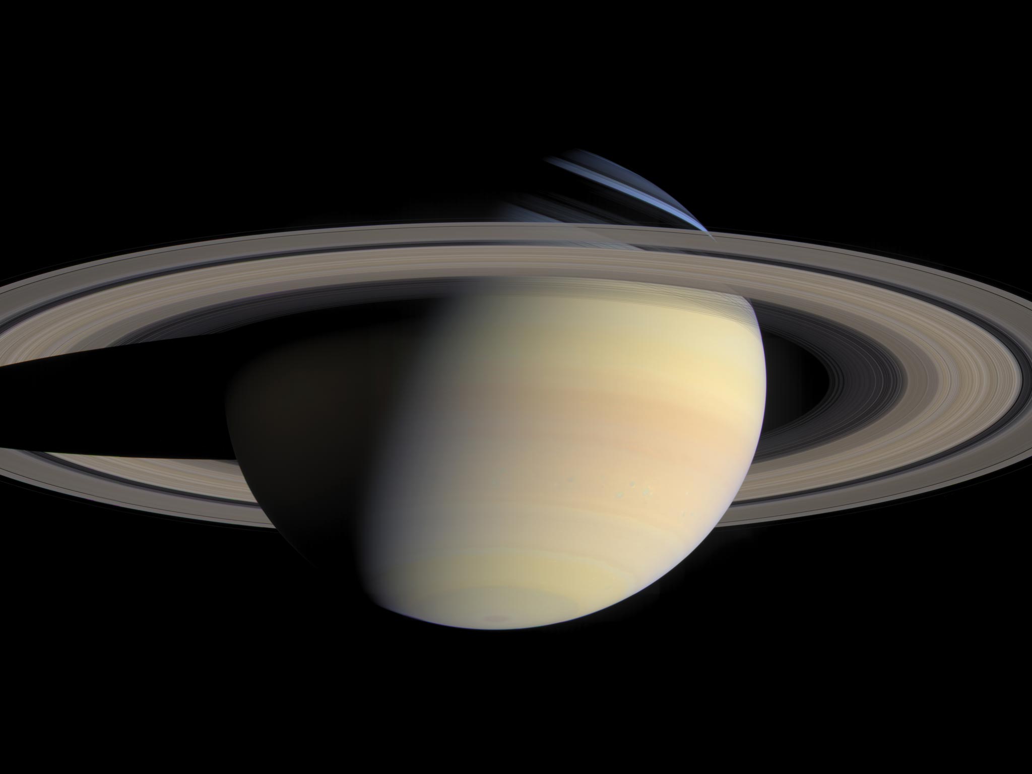 6 Oct 2004: While cruising around Saturn in early October 2004, Cassini captured a series of images that have been composed into this large global natural color view of Saturn and its rings