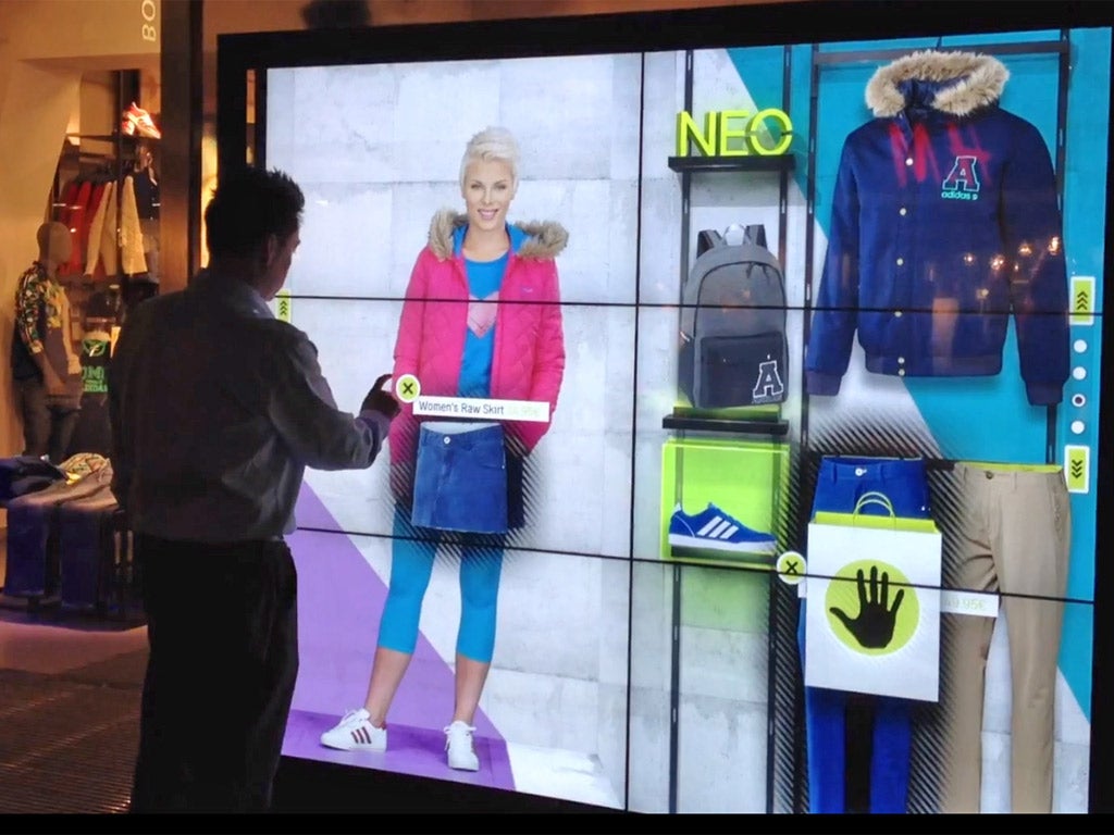 An interactive window in an Adidas shop