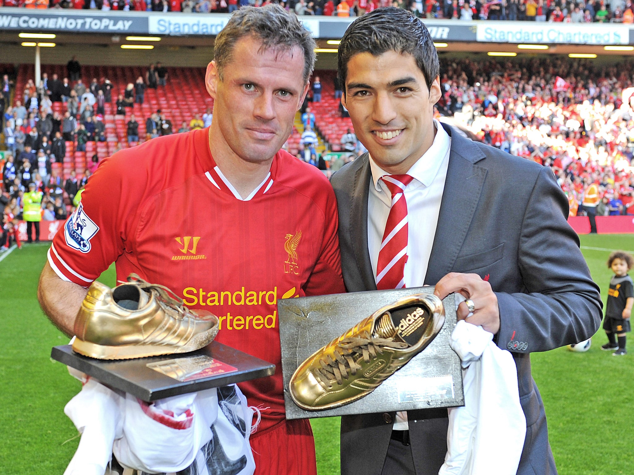 Jamie Carragher with Luis Suarez at the end of last season
