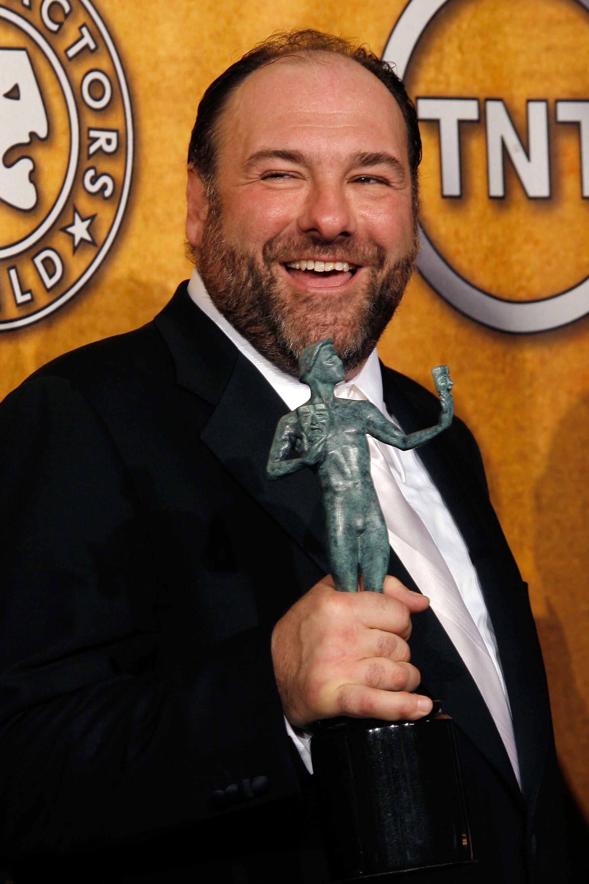 James Gandolfini poses with his Screen Actors Guild Award for Outstanding Performance by a Male Actor in a Drama Series for 'The Sopranos,' 2008