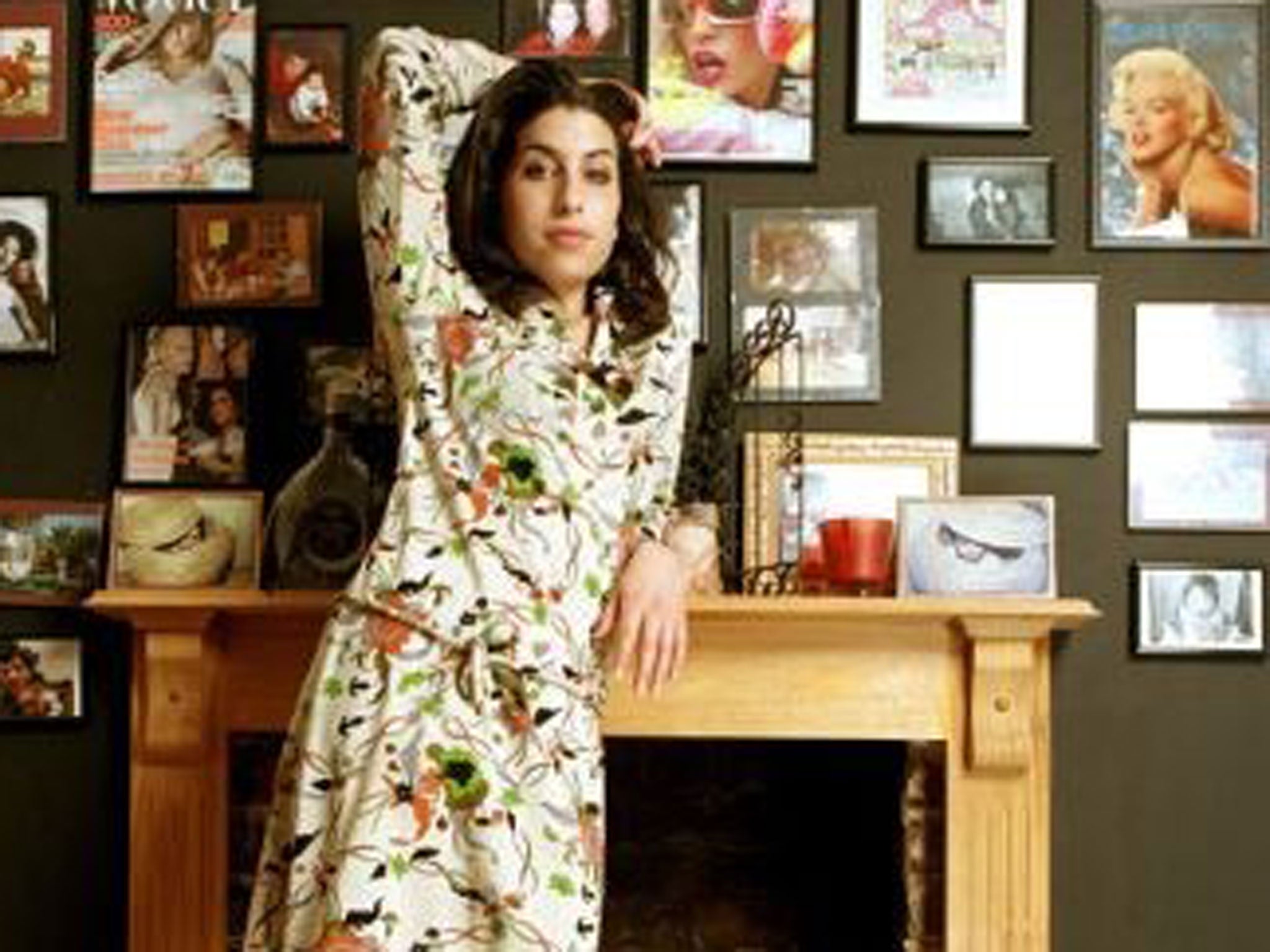 Amy Winehouse poses for photos at her home in Camden, London