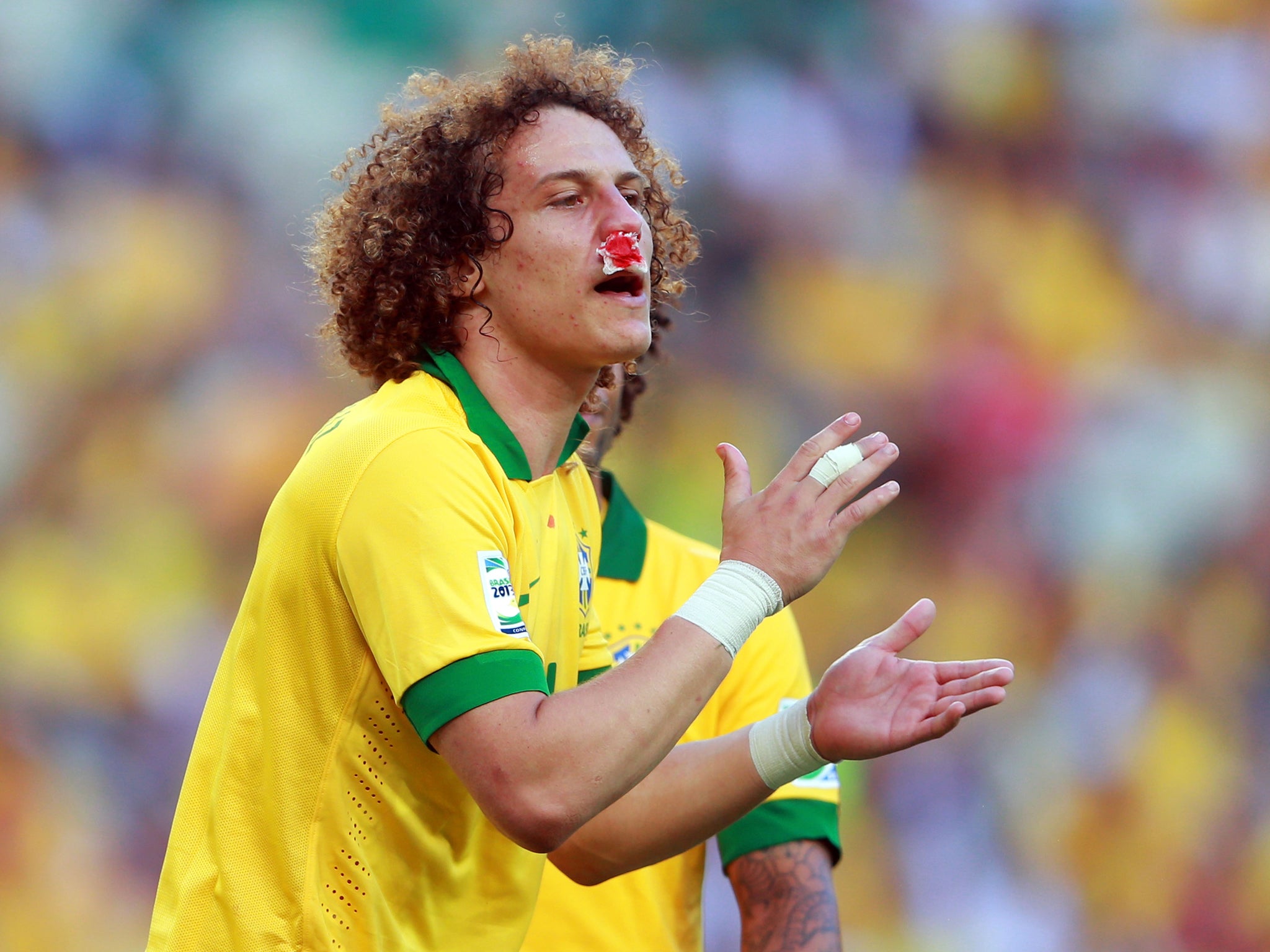 David Luiz in action for Brazil after he suffered a broken nose