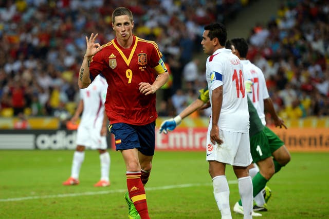 Fernando Torres celebrates one of his four goals against Tahiti