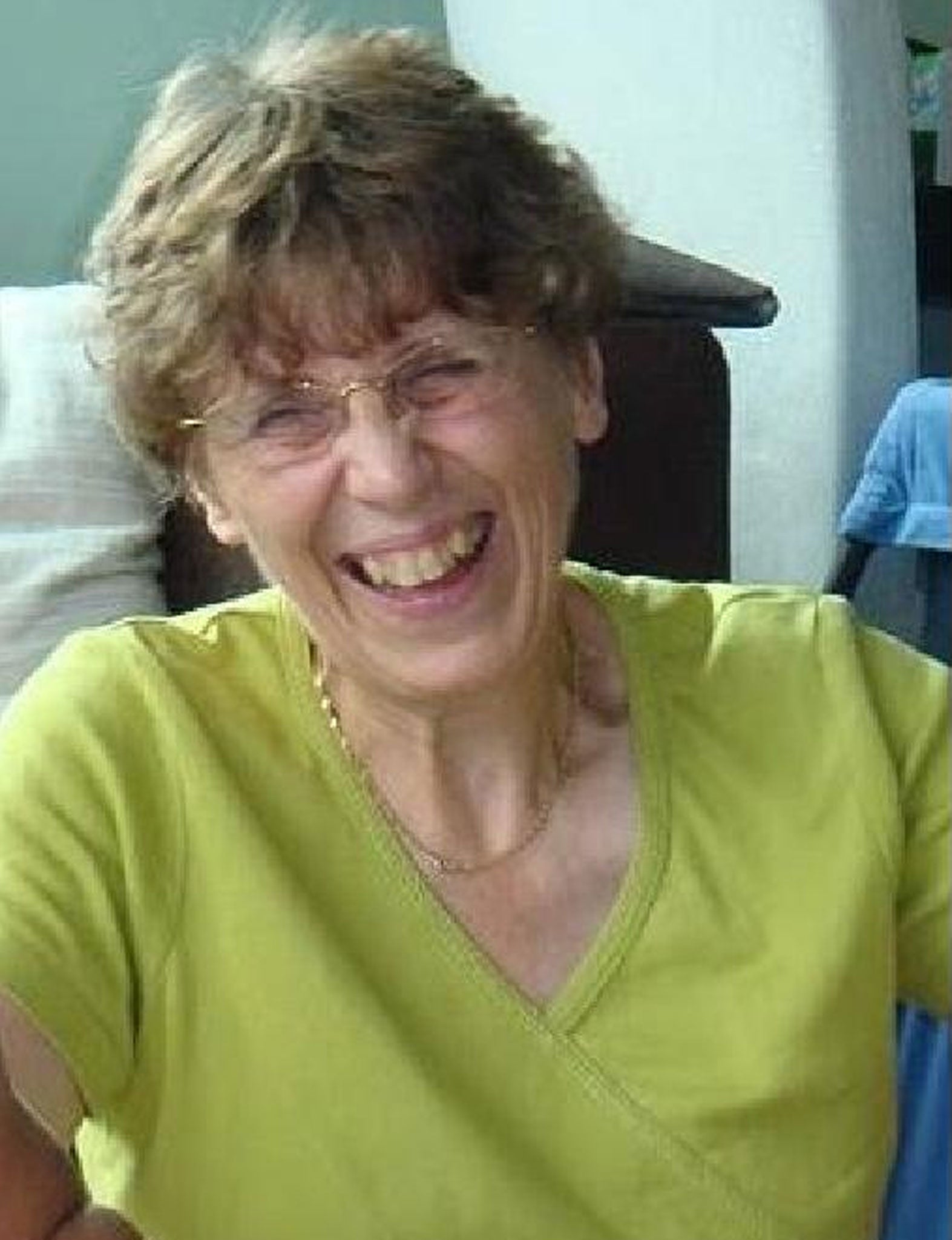 The body of Janet Gilson, 64, was found hidden under a sofa in Hong Kong
