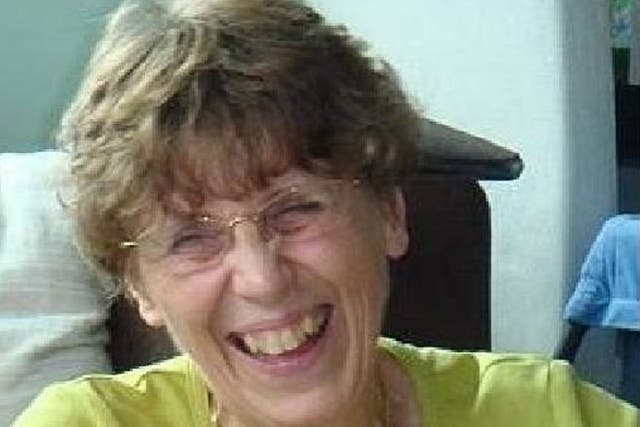 The body of Janet Gilson, 64, was found hidden under a sofa in Hong Kong