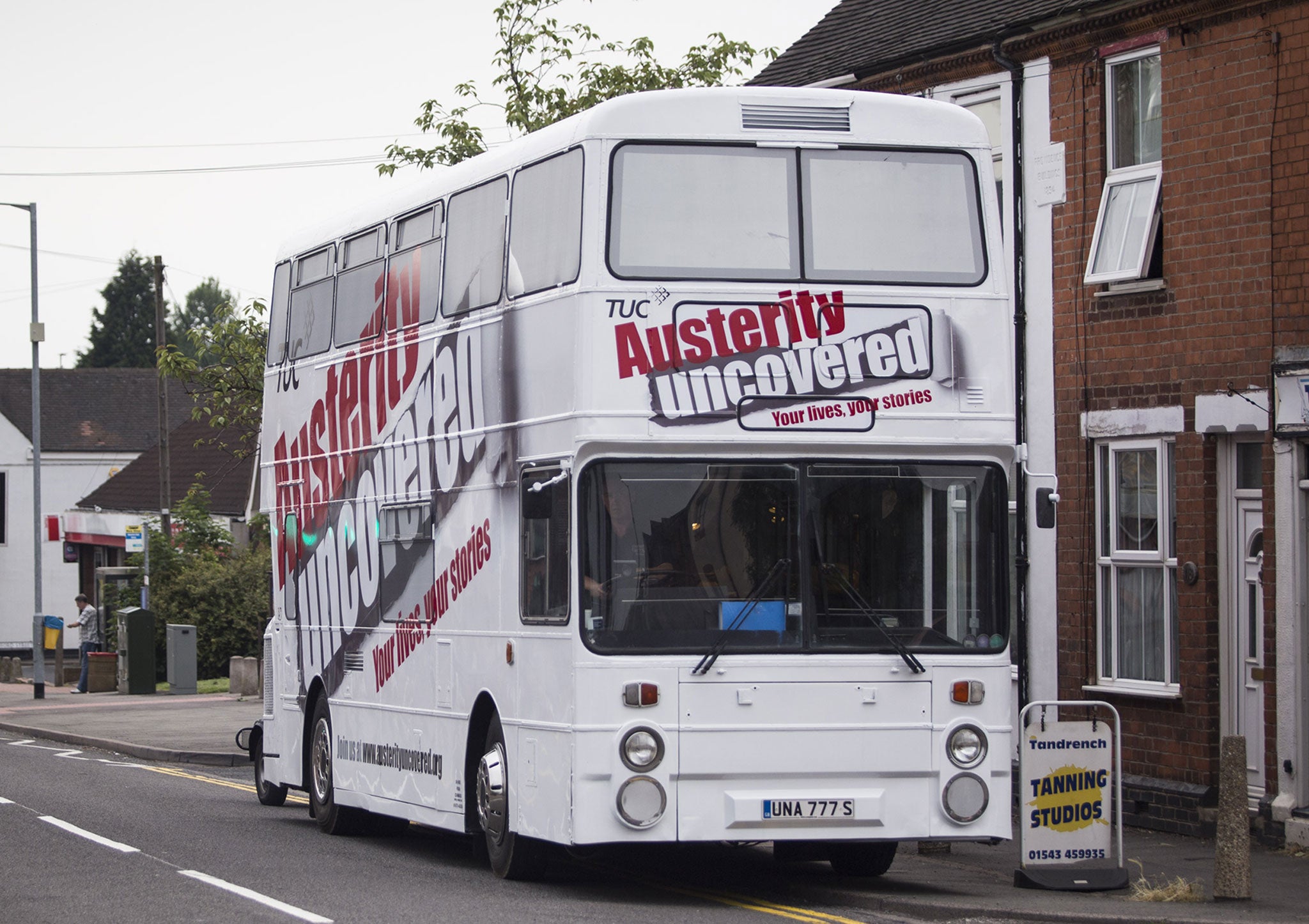 TUC 'austerity bus' visits struggling West Midlands as it tours country to highlight the impact of Coalition cuts on UK workers and families