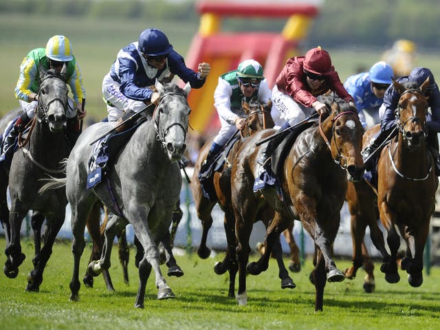 Sky Lantern (L) powers past the field to win the Coronation Stakes at Royal Ascot