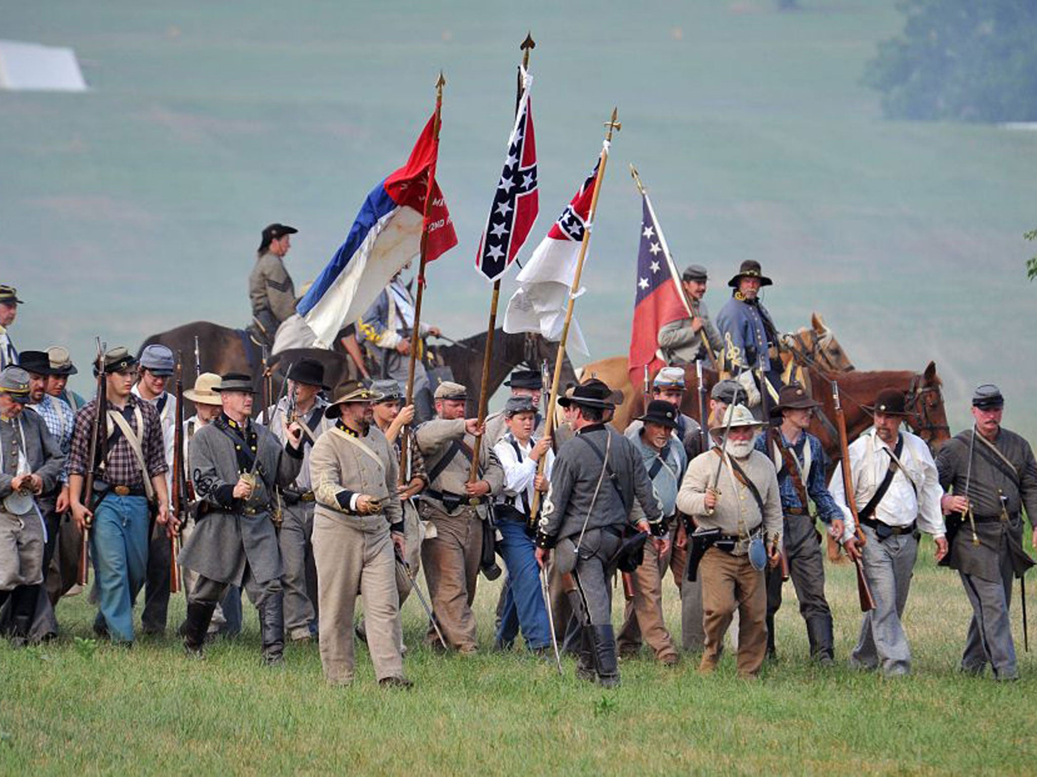 Confederate troops advance in a re-enactment of the 1863 Battle of Gettysburg, during which 7,000 soldiers died