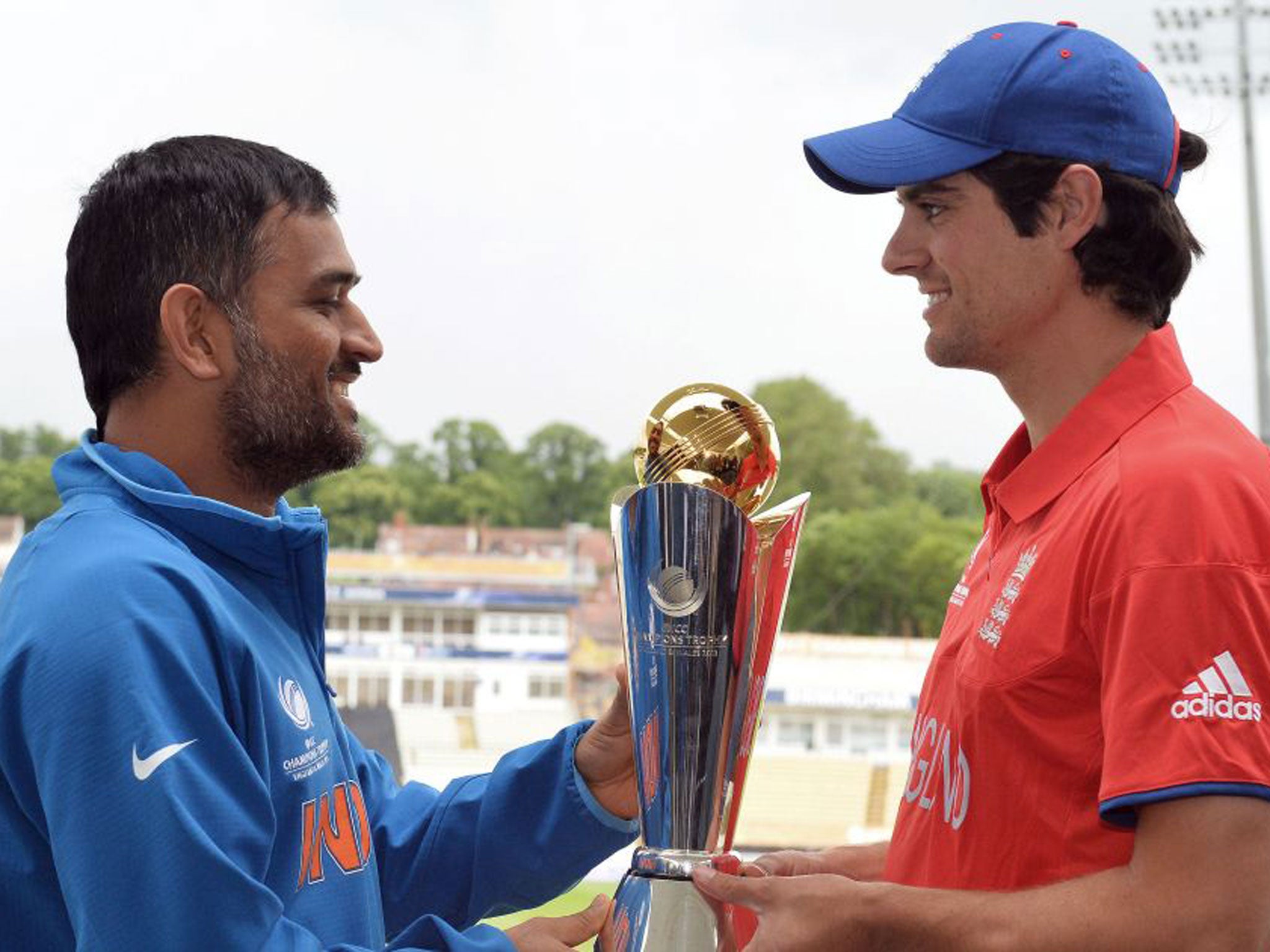 England captain Alastair Cook (right), India’s MS Dhoni and the Champions Trophy