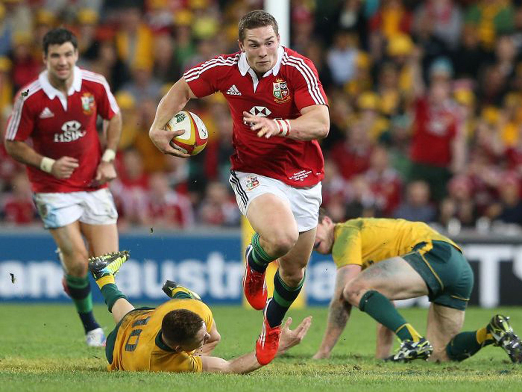 Australia’s Israel Folau and the Lions’ George North are similar in style and intensity