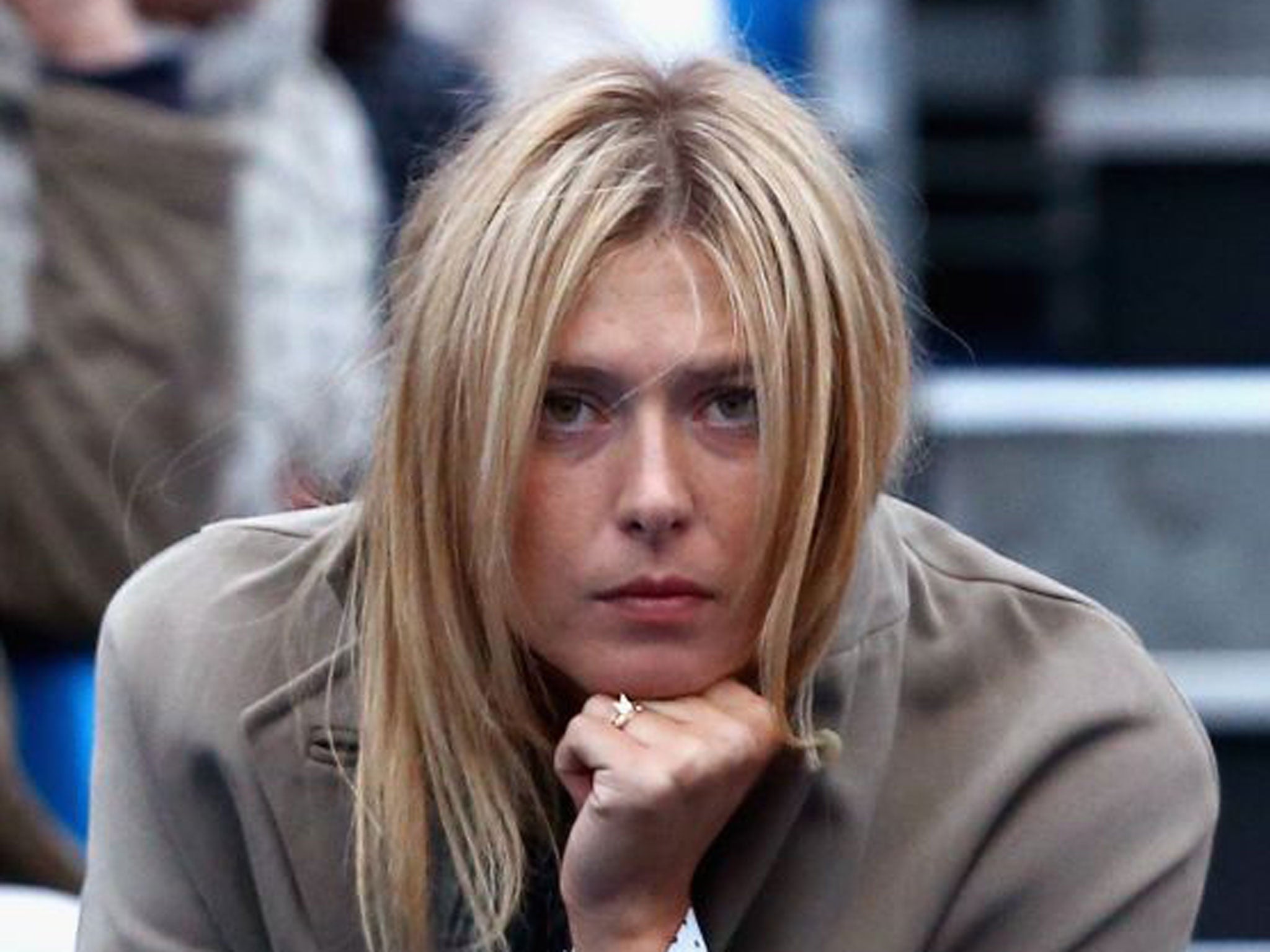 Pair-shaped: Sharapova watches boyfriend Dimitrov who allegedly had an affair with Williams who is allegedly now with Mouratoglou