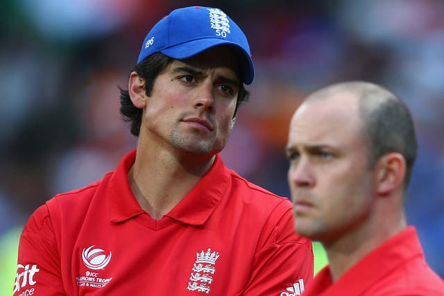 Alastair Cook and Jonathan Trott look dejected as India shine