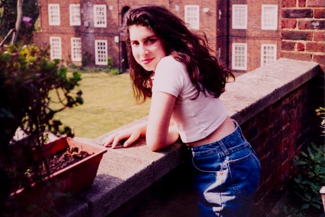 A young Amy outside her nan's flat in Southgate