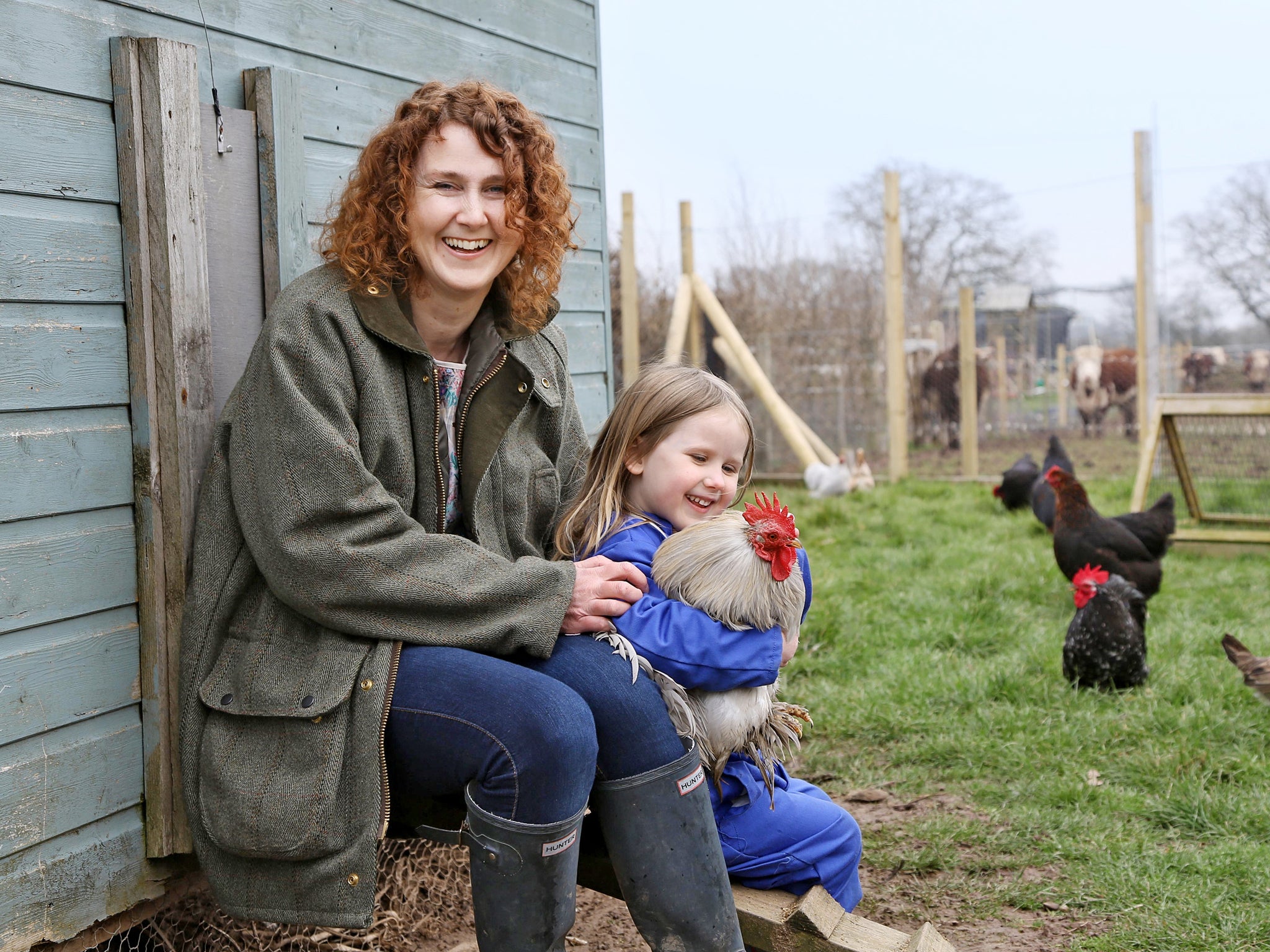 After the storm: Kirsty Grocott at home in Shropshire with her youngest child, Minnie, now aged four