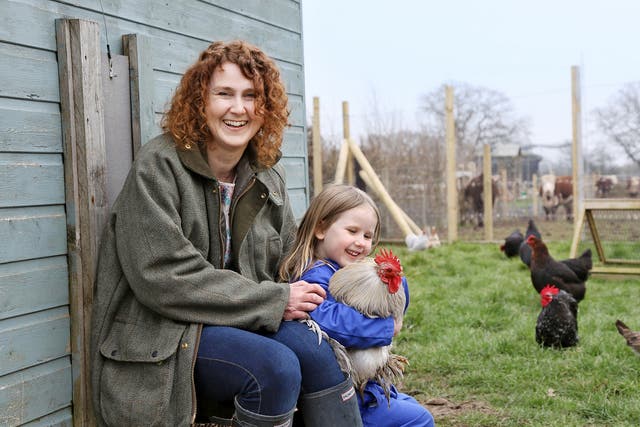 After the storm: Kirsty Grocott at home in Shropshire with her youngest child, Minnie, now aged four