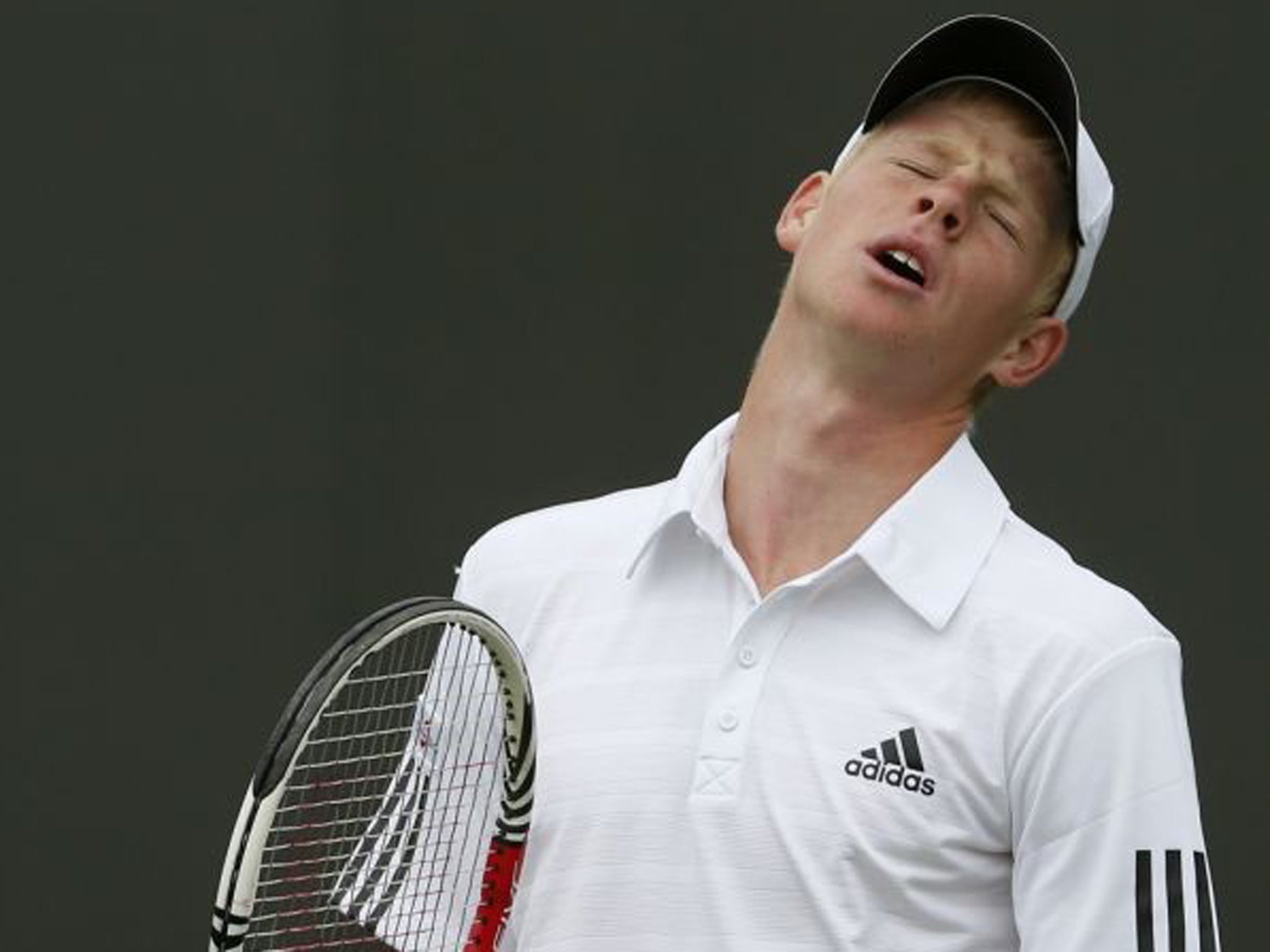 Kyle Edmund of Britain reacts during his men's singles tennis match against Jerzy Janowicz