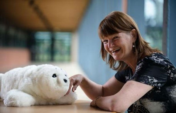 Professor Glenda Cook of Northumbria University with the robotic harp seal