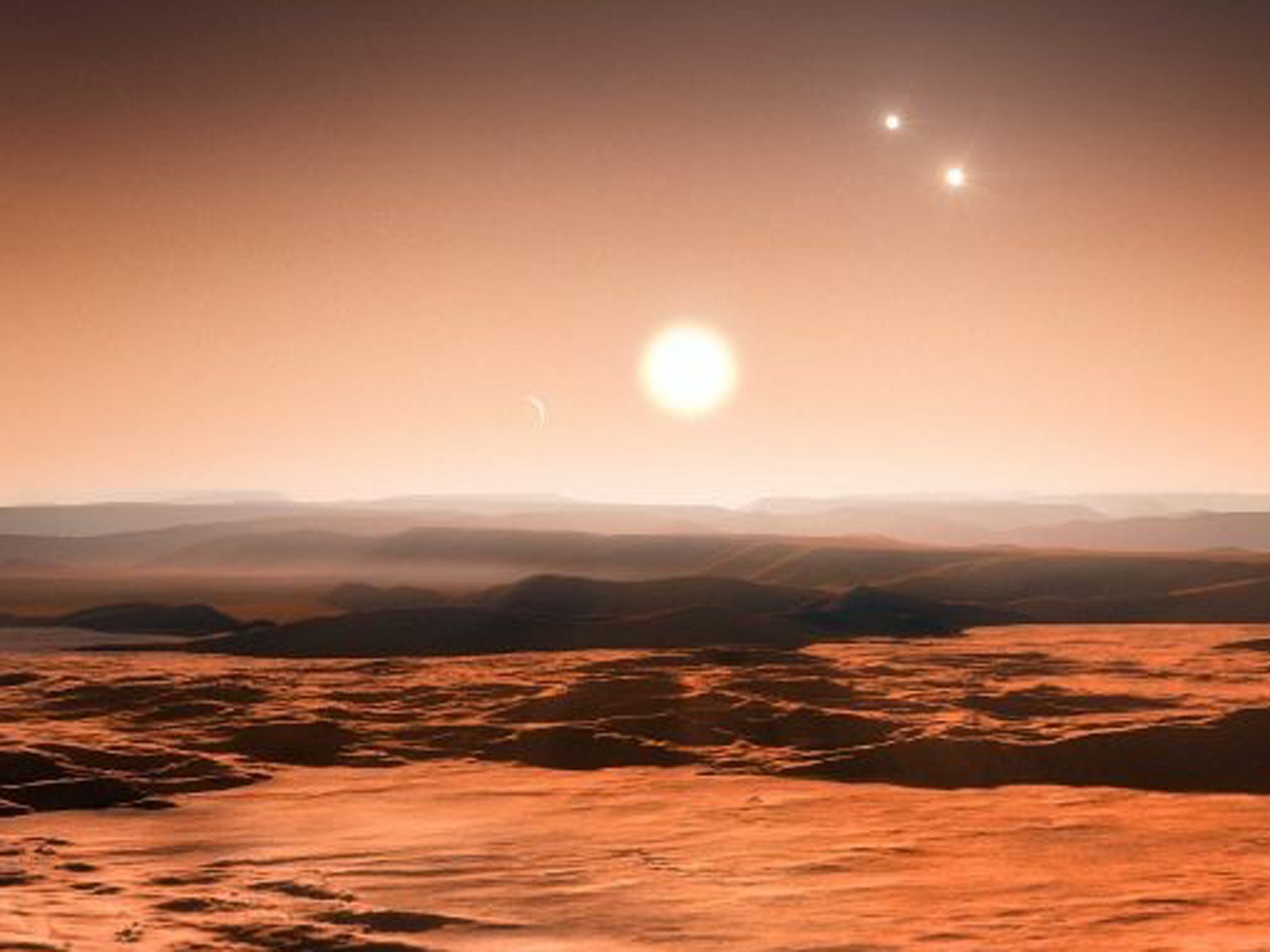An image provided by the European Southern Observatory (ESO) shows an artists impression of the view from the exoplanet Gliese 667Cd looking towards the planet's parent star (Gliese 667C). In the background to the right, the more distant stars in this tri