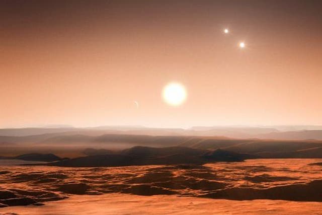 An image provided by the European Southern Observatory (ESO) shows an artists impression of the view from the exoplanet Gliese 667Cd looking towards the planet's parent star (Gliese 667C). In the background to the right, the more distant stars in this tri