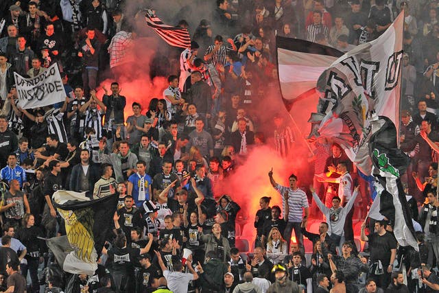 Udinese's fans at the Friuli Stadium. Udinese were one of the 18 Serie A clubs raided