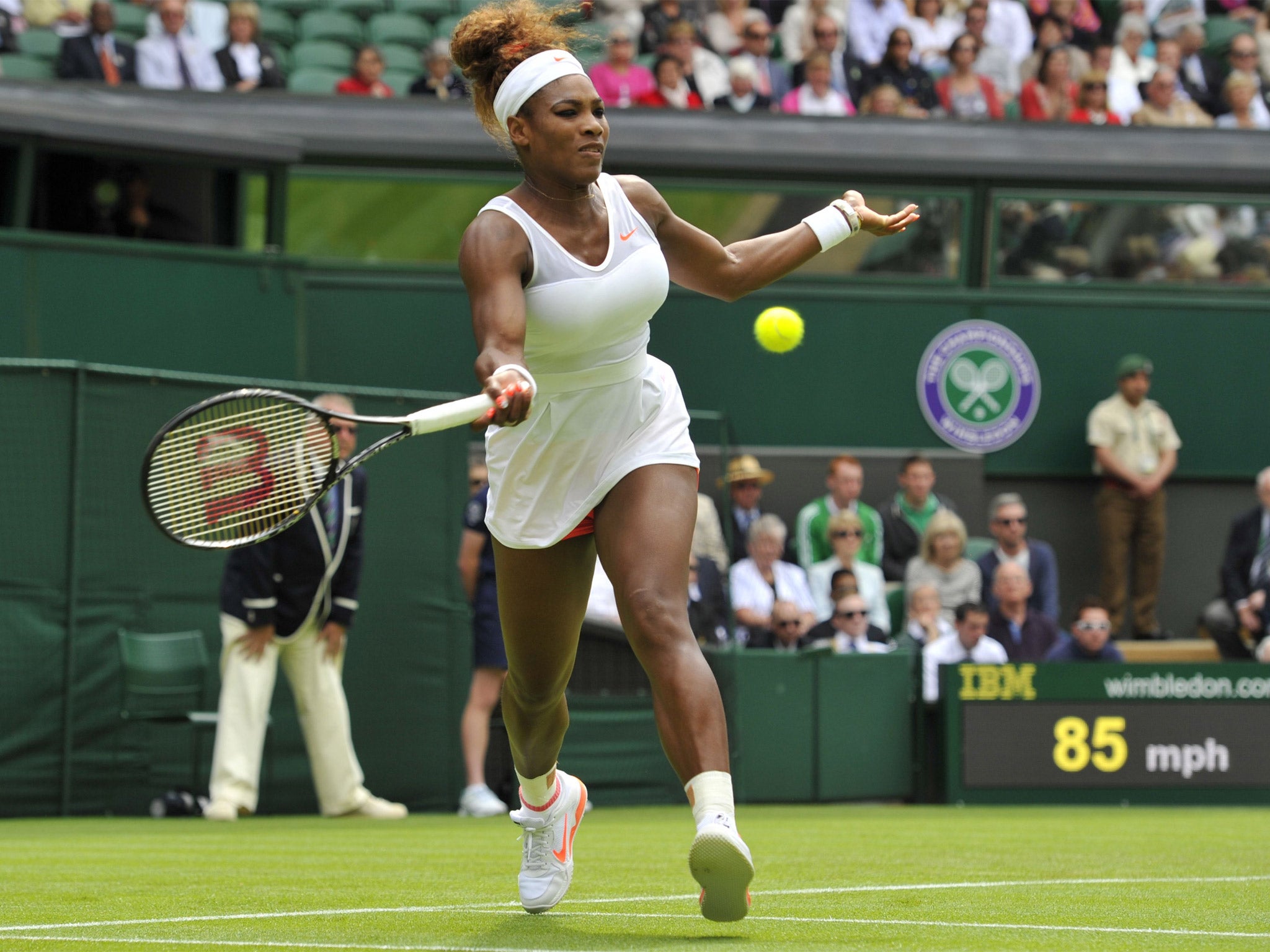 Serena Williams hits a return during her first-round win over Mandy Minella