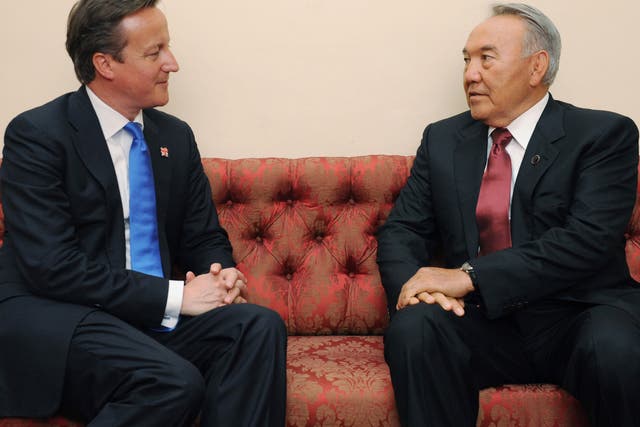 Prime Minister David Cameron chats with President of Kazakhstan Nursultan Nazarbayev at a reception at Buckingham Palace for Heads of State and Government attending the Olympics Opening Ceremony on July 27, 2012 in London, England.