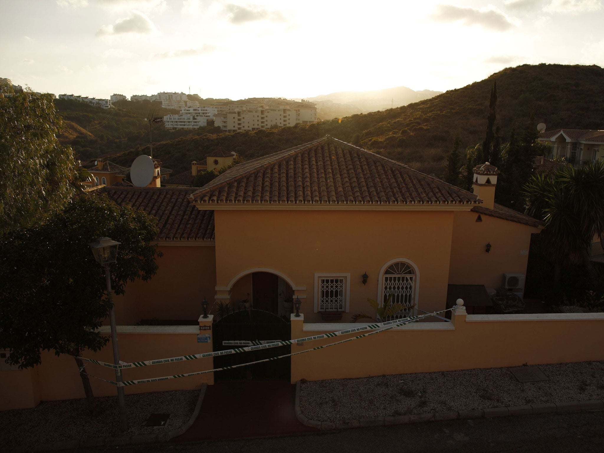 House sealed off by the Spanish civil guard where three members of a British family were found dead inside in Mijas Costa