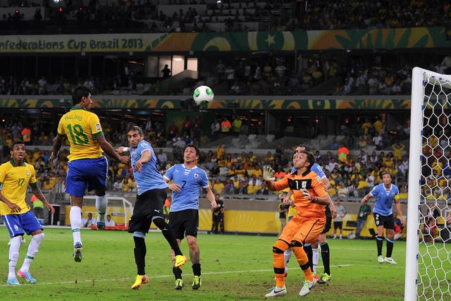 Paulinho of Brazil scores his team's second goal to make the score 2-1 during the FIFA Confederations Cup Brazil 2013 Semi Final match between Brazil and Uruguay