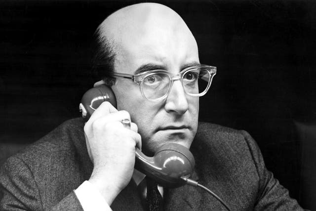 Peter Sellers, as President Merkin Muffley in Dr Stragelove, using the mythical red phone