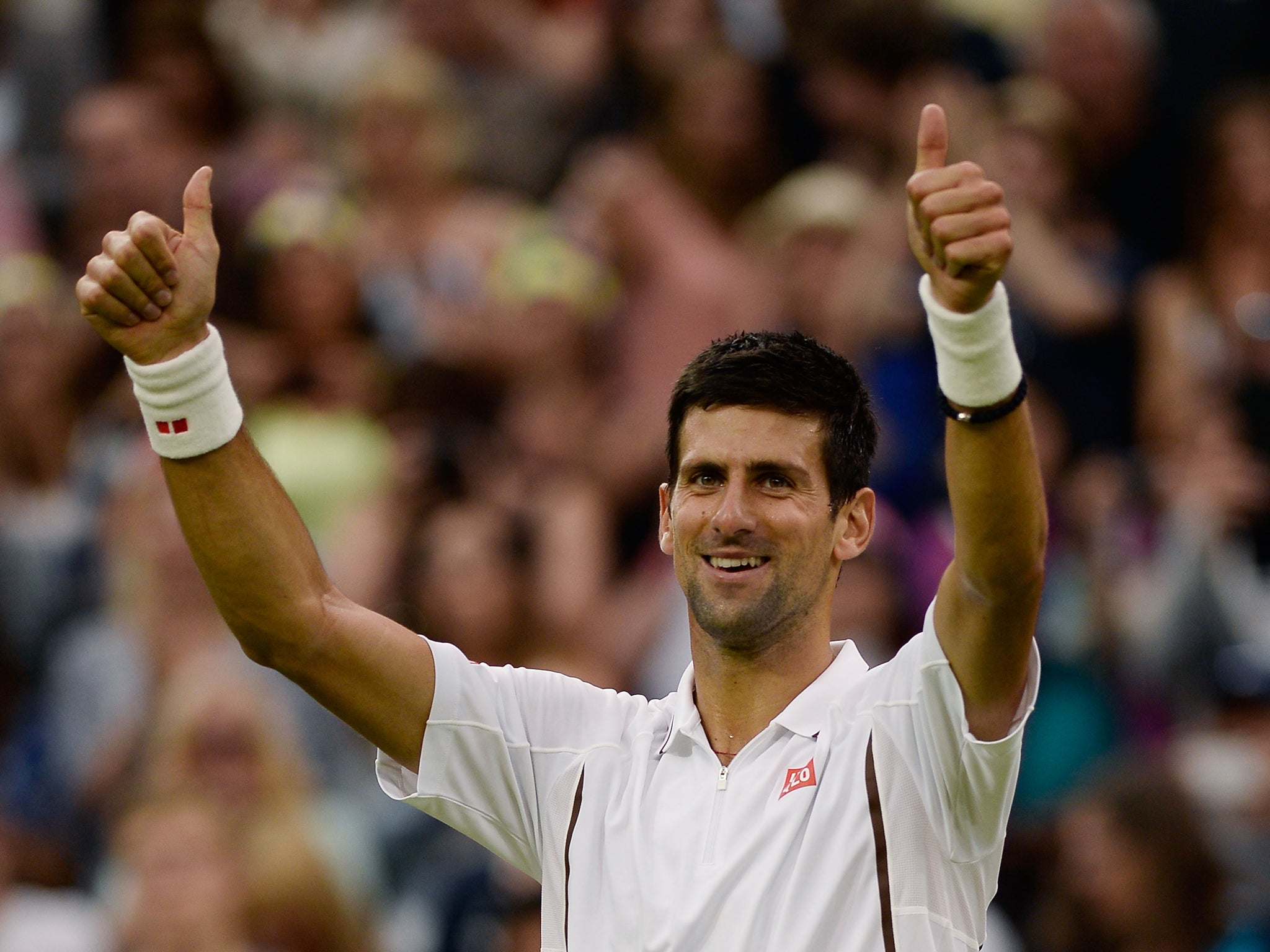 Novak Djokovic celebrates his second round victory over Bobby Reynolds