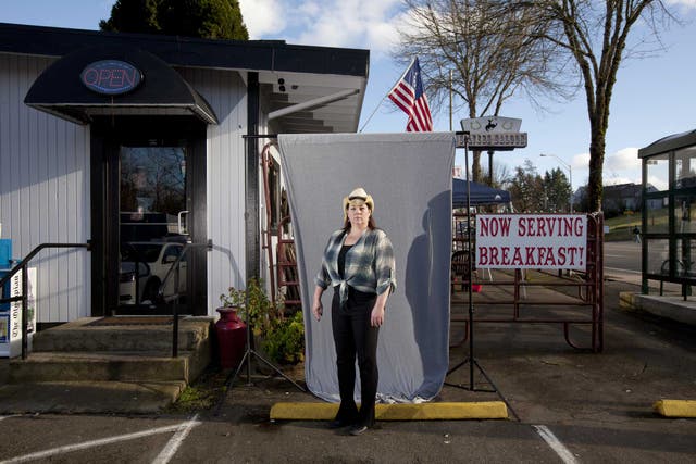 Washington State: Mary Ballou, 41, barmaid, photographed outside a diner in Olympia