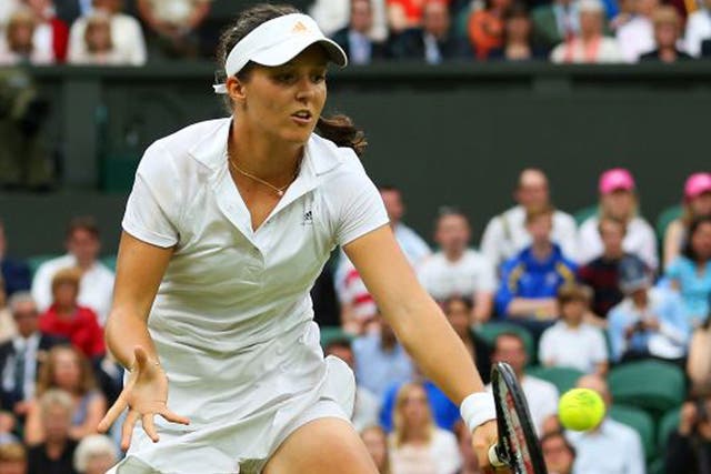 Laura Robson volleys a return during her 6-4, 6-1 victory over Mariana Duque-Marino