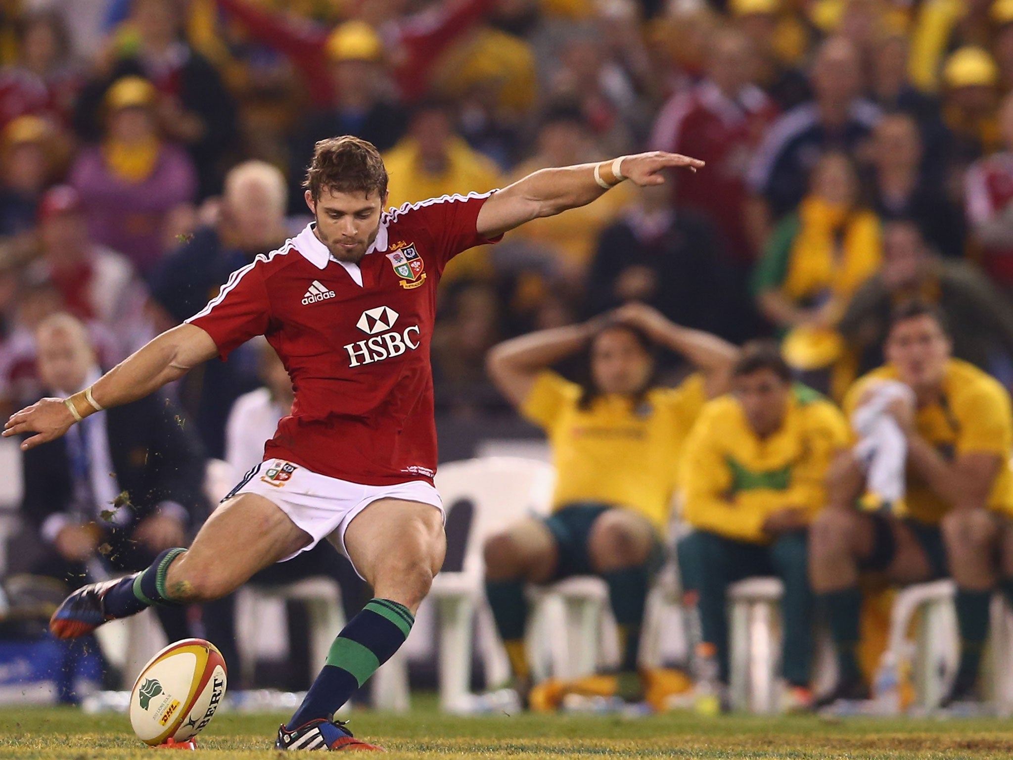 Tense: Australia players and fans watch in suspense as Halfpenny holds the destiny of the series in his hands