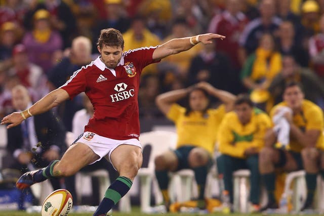 Tense: Australia players and fans watch in suspense as Halfpenny holds the destiny of the series in his hands