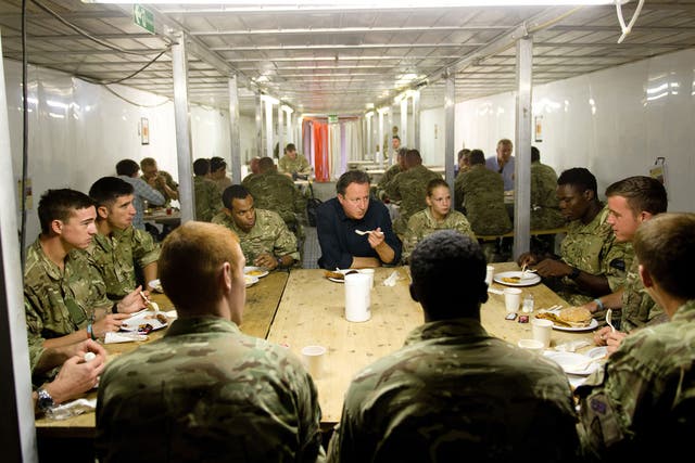 The Prime Minister eating breakfast with troops