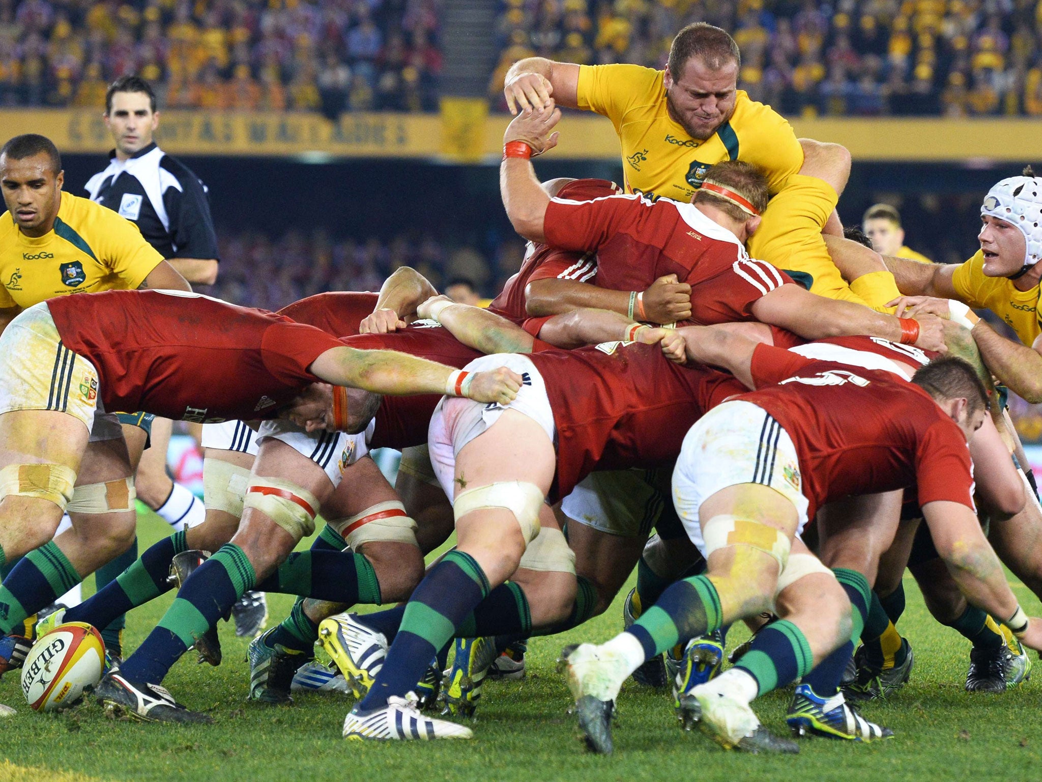 Crash course: Ben Alexander (top) pops out as the scrum engages