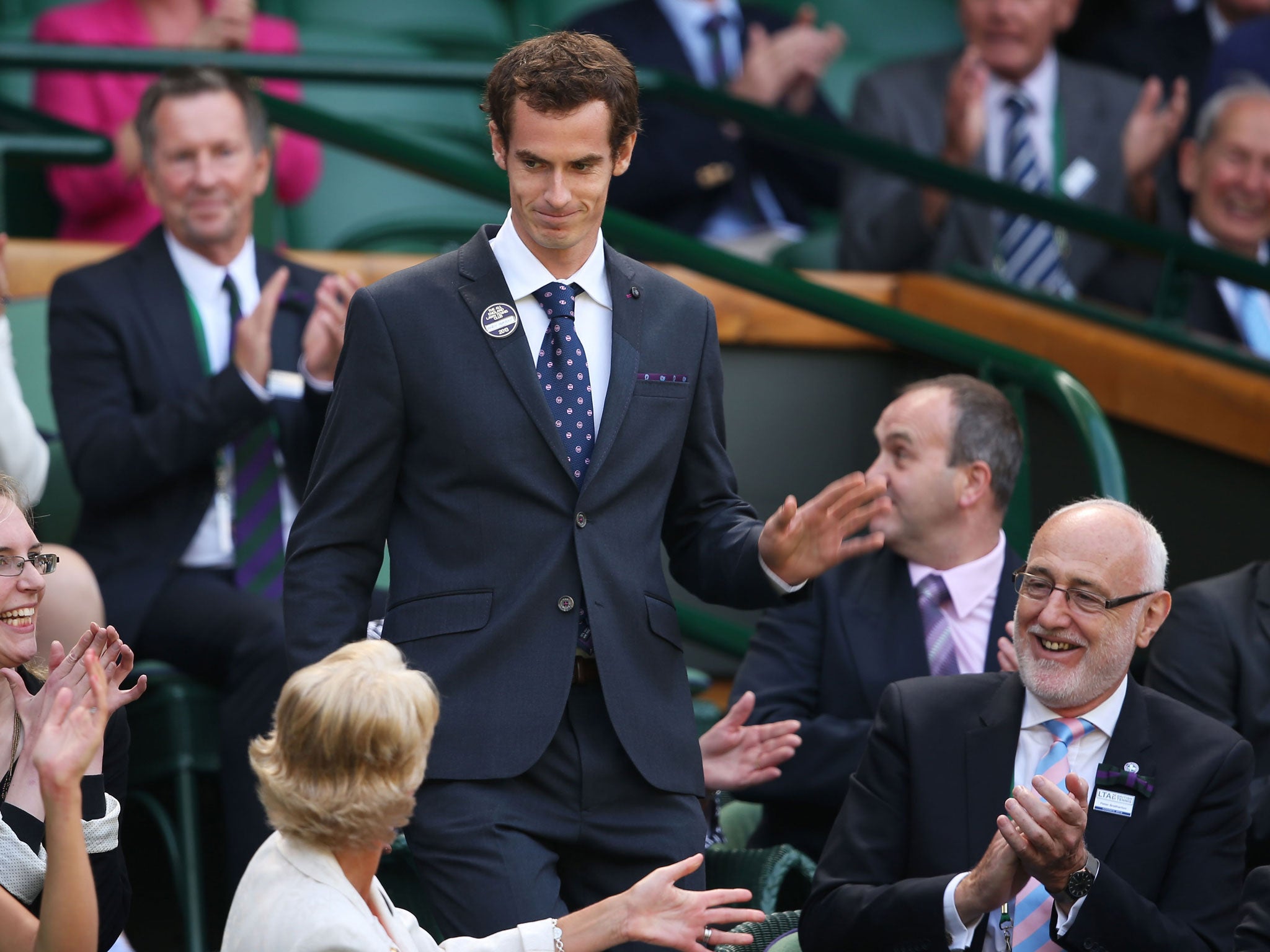 The in crowd: Andy Murray takes his seat in the Royal Box after being introduced with fellow Olympic gold medalists
